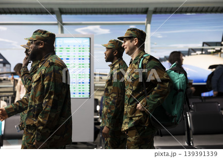 Walking, catching plane and close up of army soldiers squad in airport hurrying. Airport checkin, homecoming and military personnel in busy departure terminal rushing to visit family 139391339