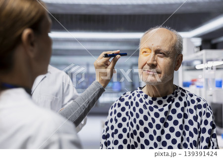 Diverse clinical scientists conducting patient examination in a lab drug study, collecting data on treatment outcomes and side effects as RD strategy. Toxicology and immunology research. 139391424