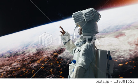 Smiling astronaut preparing to land on outer space celestial body. Jolly cosmonaut in high tech suit exploring deep space with starship, doing Martian surface research, rotating 360 degrees, camera B Smiling astronaut preparing to land on outer space celestial body. Jolly cosmonaut in high tech suit exploring deep space with starship, doing Martian surface research, rotating 360 degrees, camera B 139391553