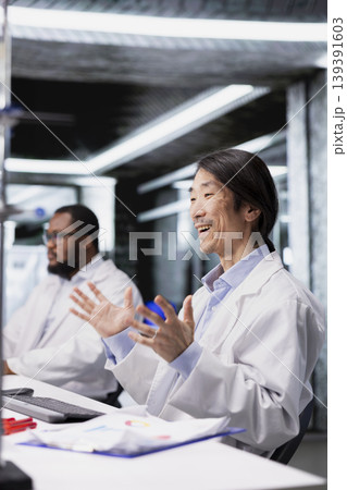 Happy laboratory scientist delighted after finding genetic markers associated with disease risk using PC. Jolly man thrilled by DNA strand mapping genomics analysis results using program on computer Happy laboratory scientist delighted after finding genetic markers associated with disease risk using PC. Jolly man thrilled by DNA strand mapping genomics analysis results using program on computer 139391603