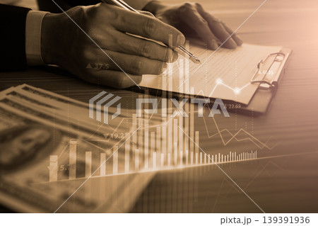 Stock market or forex trading graph and candlestick chart suitable for financial investment concept. Economy trends background for business idea and all art work design. Abstract finance background. Stock market or forex trading graph and candlestick chart suitable for financial investment concept. Economy trends background for business idea and all art work design. Abstract finance background. 139391936