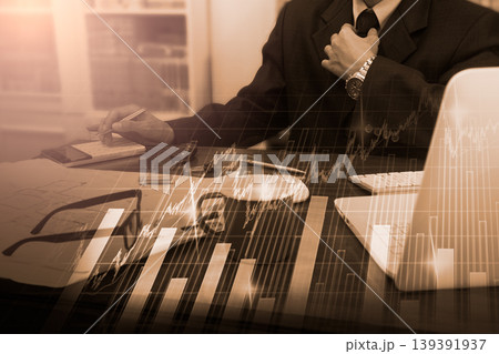 Stock market or forex trading graph and candlestick chart suitable for financial investment concept. Economy trends background for business idea and all art work design. Abstract finance background. Stock market or forex trading graph and candlestick chart suitable for financial investment concept. Economy trends background for business idea and all art work design. Abstract finance background. 139391937