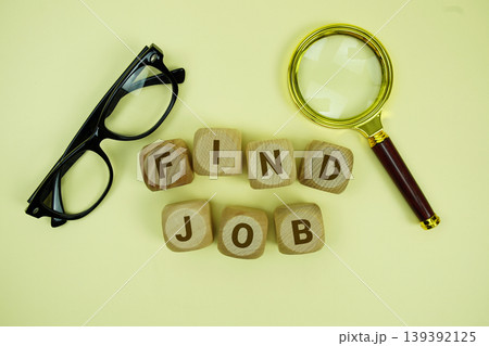 FIND JOB alphabet letters with magnifying glass and eye glasses on yellow background 139392125