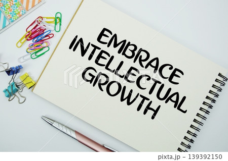 Embrace Intellectual Growth text message written on notepad with stationery flat lay on white background Embrace Intellectual Growth text message written on notepad with stationery flat lay on white background 139392150