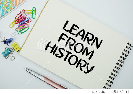 Learn From History text message written on notepad with stationery flat lay on white background Learn From History text message written on notepad with stationery flat lay on white background 139392151