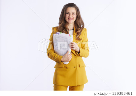 Organized Businesswoman Holding Financial Documents 139393461