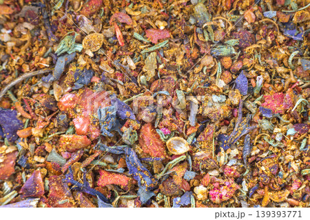 Abstract textured natural bright orange colorful copy space background. Millet, oak, different grains small particles, fish and parrot food. Abstract textured natural bright orange colorful copy space background. Millet, oak, different grains small particles, fish and parrot food. 139393771