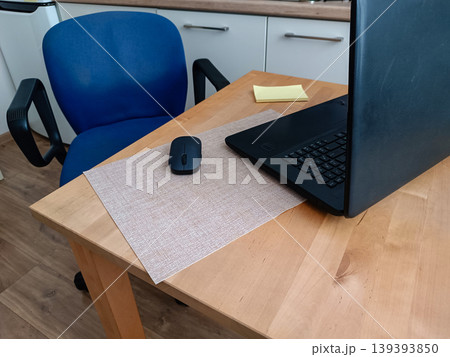 Home Office Desk Setup with Laptop and Mouse Home Office Desk Setup with Laptop and Mouse 139393850