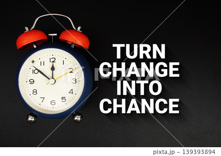 Turn Change Into Chance text with alarm clock on black background 139393894