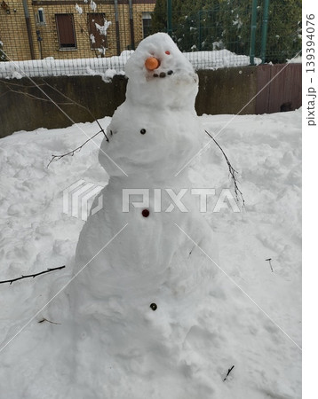 A snowman, or snow woman, is stylized human figure or sculpture made of snow. Building a snowman is winter pastime that originated in ancient times. It symbolizes the spirit of winter and snowstorms. 139394076
