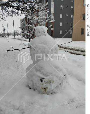 A snowman, or snow woman, is stylized human figure or sculpture made of snow. Building a snowman is winter pastime that originated in ancient times. It symbolizes the spirit of winter and snowstorms. 139394079