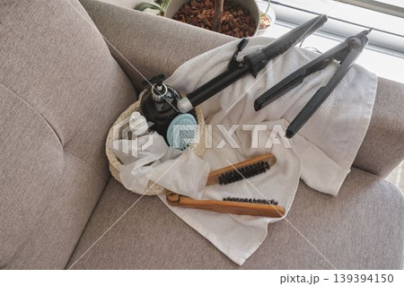 Hair care and beauty routine with styling tools 139394150