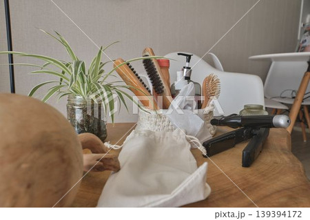 Hair care products with brushes, shampoo, and hair straightener Hair care products with brushes, shampoo, and hair straightener 139394172