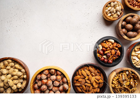 Assortment of nuts in bowls Assortment of nuts in bowls 139395133