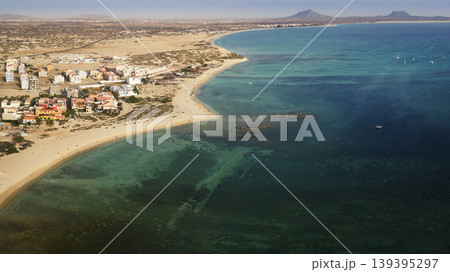 Aerial shot of Sal Rei town sandy beach and yacht moored in the shore 139395297