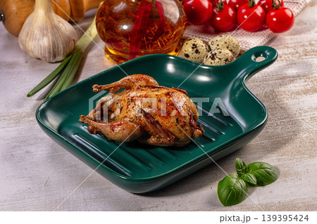 Roasted Quail Dish with Fresh Ingredients and Spices 139395424