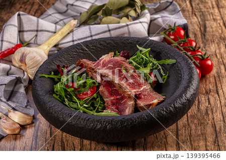 Sliced Beef Steak Salad Arugula Cherry Tomatoes Rustic Wooden Background 139395466