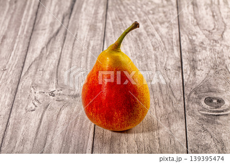 Ripe red yellow pear rustic wooden background Ripe red yellow pear rustic wooden background 139395474