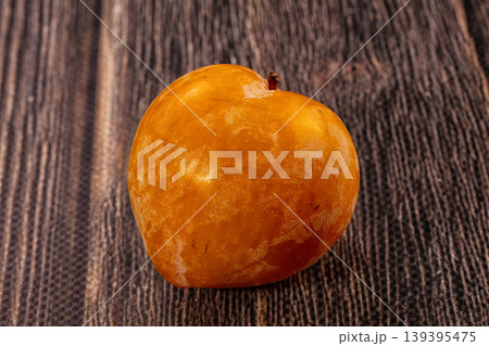 Fresh yellow plums, gray textured background. Healthy fruit still life 139395475