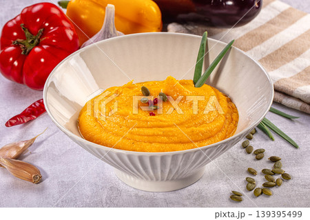 Creamy vegetable dip with pumpkin seeds and fresh ingredients Creamy vegetable dip with pumpkin seeds and fresh ingredients 139395499