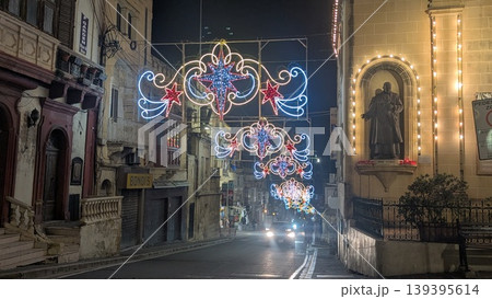 Christmas lights on the street at night in Gozo 139395614