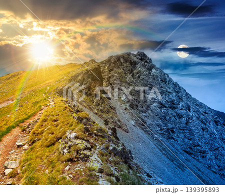 day meet night. mountain scenery on summer solstice. sun and moon over gorgeous mountainous landscape. background with rocky cliffs and grassy hillsides under a epic sky. ridge of southern mountains day meet night. mountain scenery on summer solstice. sun and moon over gorgeous mountainous landscape. background with rocky cliffs and grassy hillsides under a epic sky. ridge of southern mountains 139395893
