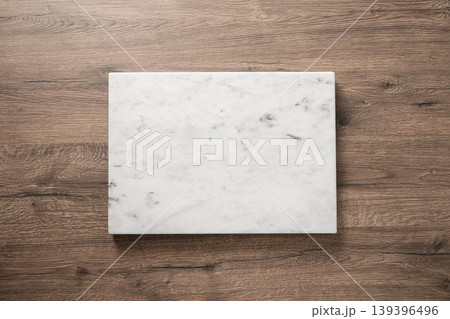 Marble board on wooden table with copy space top view 139396496