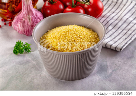 Vegan cuisine - raw dry couscous 139396554