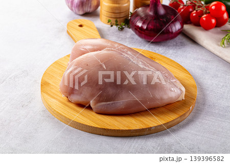 Raw chicken breast without skin 139396582