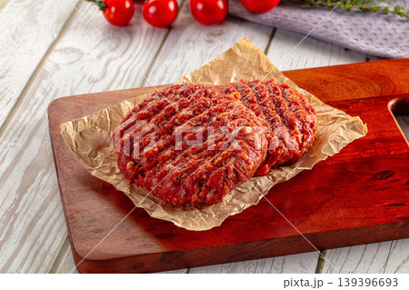 Raw uncoocked red beef round cutlet Raw uncoocked red beef round cutlet 139396693