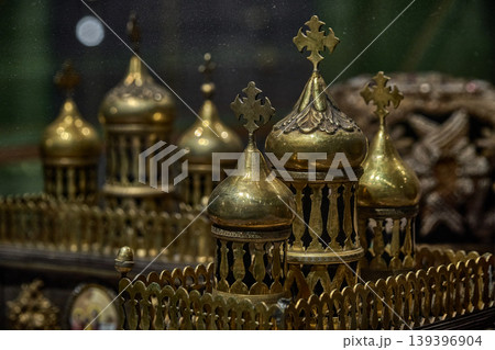 Ornate Orthodox church chalice with icon of Jesus Christ, religious liturgical object close up 139396904