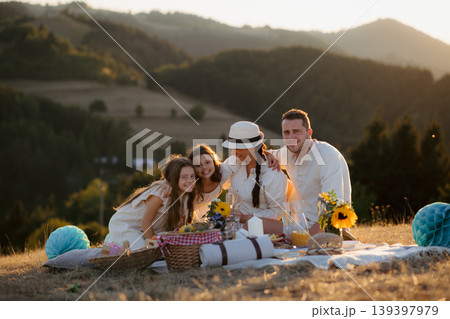 Happy family with children having picnic in nature. Happy family with children having picnic in nature. 139397979