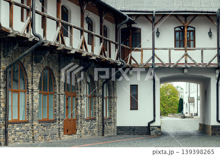 historical building inside court yard Europe architecture cobble stone street and facade campus 139398265