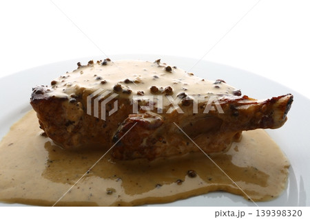 Entrecote Steak with Green Pepper Sauce on Plate 139398320
