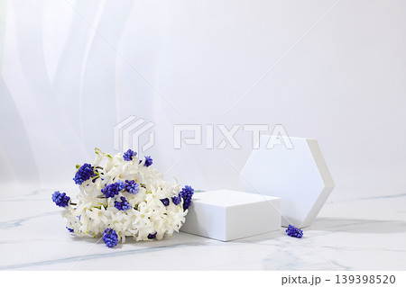Empty product podium and fresh live spring flowers.Abstract beautiful flower arrangement with hyacinths and muscari,banner.Stage for business concept.Minimal modern aesthetics ,elegant beauty concept, Empty product podium and fresh live spring flowers.Abstract beautiful flower arrangement with hyacinths and muscari,banner.Stage for business concept.Minimal modern aesthetics ,elegant beauty concept, 139398520