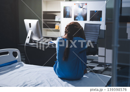 A patient with depression looks outside. A patient with depression looks outside. 139398576