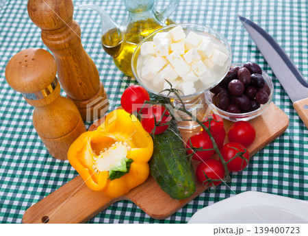 Traditional Greek fresh vegetable salad with feta cheese and herbs 139400723