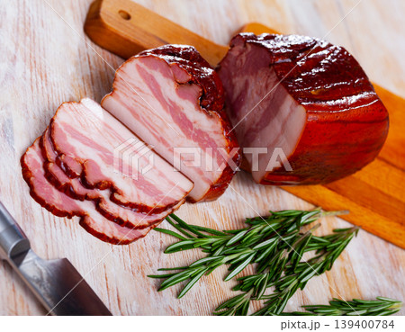 Russian snack slicing smoked brisket served on wooden board Russian snack slicing smoked brisket served on wooden board 139400784