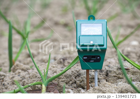 Soil Moisture And pH Meter Sensor Monitoring Garden Soil For Healthy Plant Growth And Irrigation Soil Moisture And pH Meter Sensor Monitoring Garden Soil For Healthy Plant Growth And Irrigation 139401725