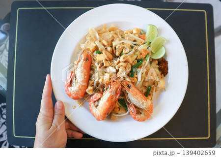 dry prawn noodles or stir fried noodles or pad thai , noodles without soup or Thai food or dry noodles or prawn noodles dry prawn noodles or stir fried noodles or pad thai , noodles without soup or Thai food or dry noodles or prawn noodles 139402659