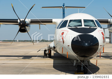 Front view of regional turboprop aircraft with propeller blades Front view of regional turboprop aircraft with propeller blades 139402831