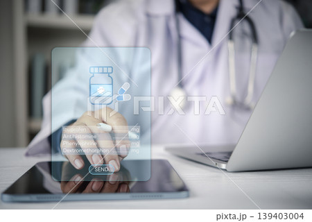 Doctor using digital tablet with hologram interface for online e-prescription. Smart healthcare technology concept showing medicine list like Ibuprofen and telemedicine service in hospital clinic. Doctor using digital tablet with hologram interface for online e-prescription. Smart healthcare technology concept showing medicine list like Ibuprofen and telemedicine service in hospital clinic. 139403004