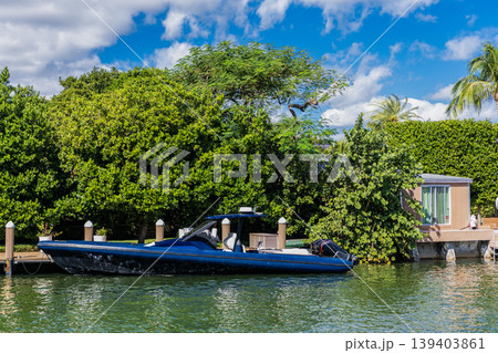 Docked yacht at private area. Sea vacation on summer. Luxury boat motor yacht in marina. Luxury yacht. Boating and yachting tourism. Luxurious lifestyle. Vacation on summer Docked yacht at private area. Sea vacation on summer. Luxury boat motor yacht in marina. Luxury yacht. Boating and yachting tourism. Luxurious lifestyle. Vacation on summer 139403861