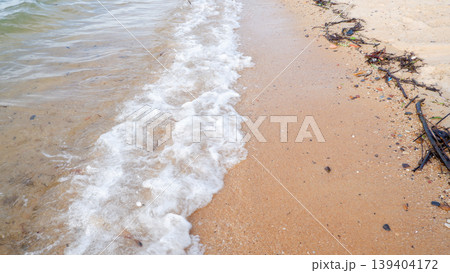 Gentle Ocean Waves Lapping on Sandy Tropical Beach Shore Gentle Ocean Waves Lapping on Sandy Tropical Beach Shore 139404172