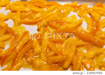 Top view of homemade candied orange peels drying Top view of homemade candied orange peels drying 139407998