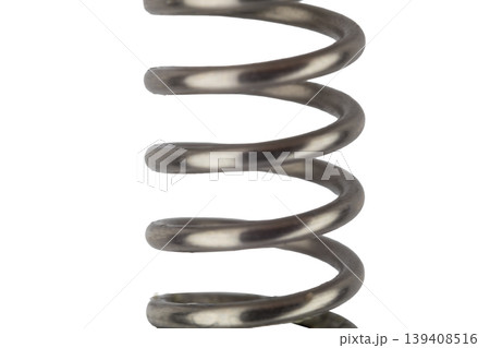 Coiled metal spring isolated on white background Coiled metal spring isolated on white background 139408516