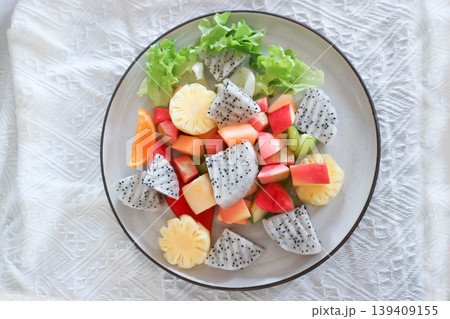 fruit salad or fruit and vegetable salad or dragon fruit , pineapple and apple salad 139409155