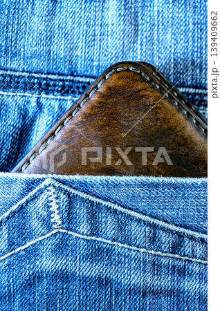 Brown Leather Wallet in Jeans Pocket. Close Up Casual Lifestyle Detail 139409662
