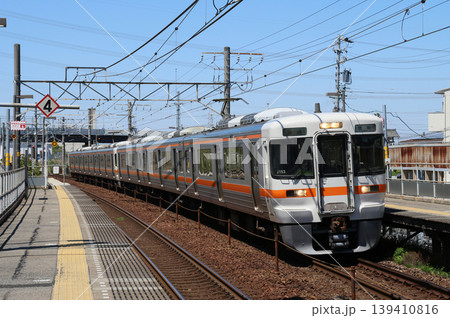 逢妻駅に到着する313系電車 139410816