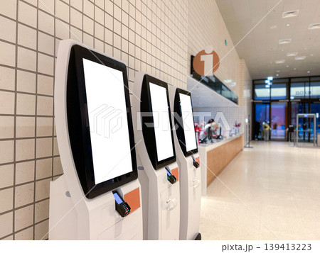 Self service terminal in Mall, shop, market airport. Modern technologies and displacement of manual labor Self service terminal in Mall, shop, market airport. Modern technologies and displacement of manual labor 139413223